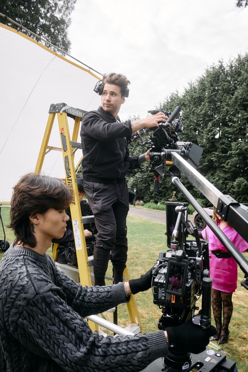 Director and crew watching a take on the monitor at video village.