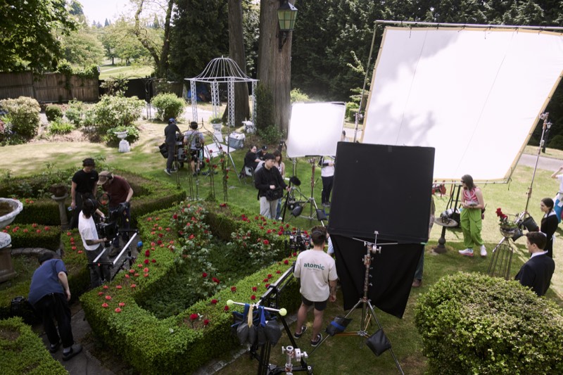 Camera rig and dolly track laid out on a production set.