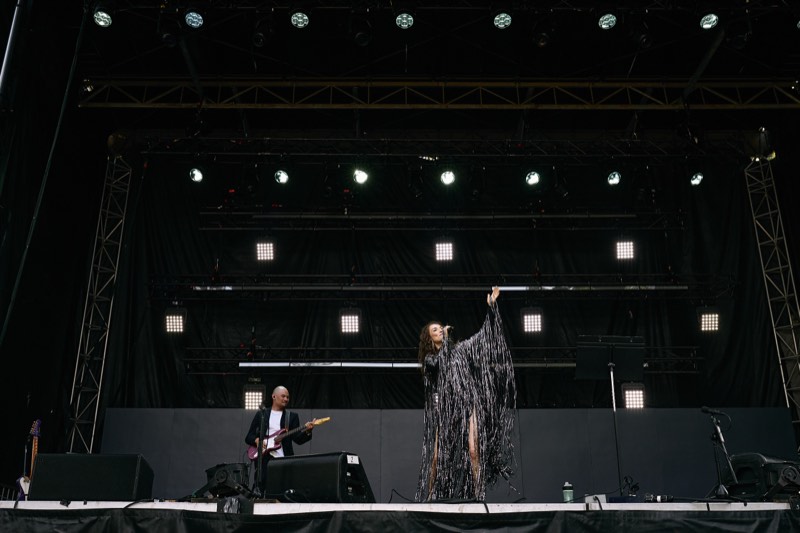 Band performing to a full room, shot from the photo pit.
