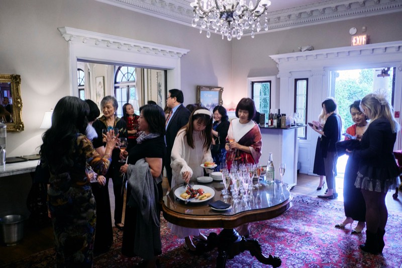 Guests mingling at a private reception in Vancouver.