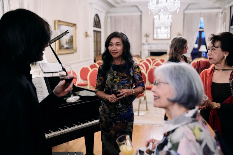 Live music performance at a corporate event, photographed candidly.