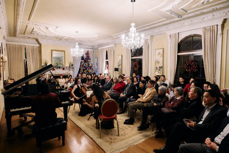 Guests mingling at a private reception in Vancouver.