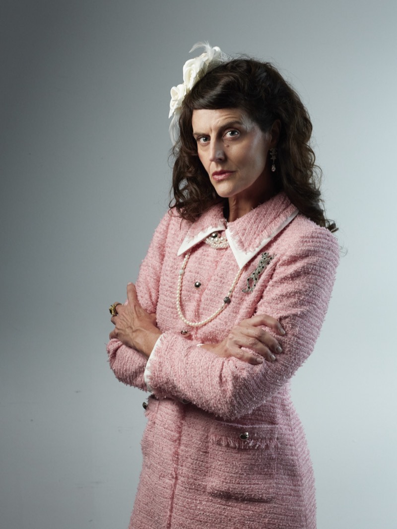 Studio headshot of a woman against a softly textured backdrop, photographed in Vancouver.