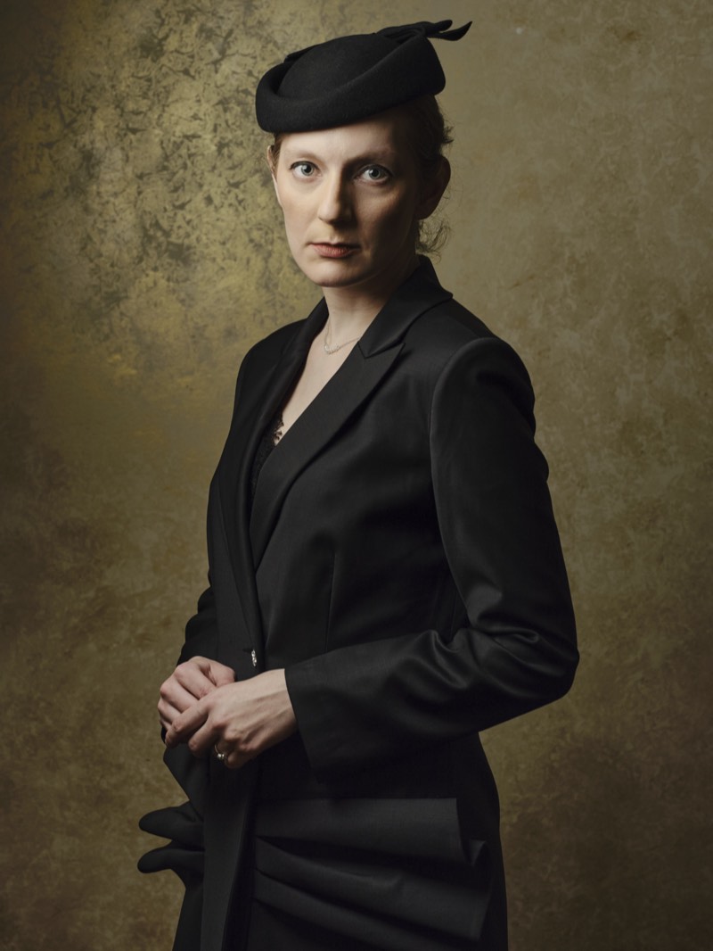 Business headshot with even lighting and a clean, uncluttered background.