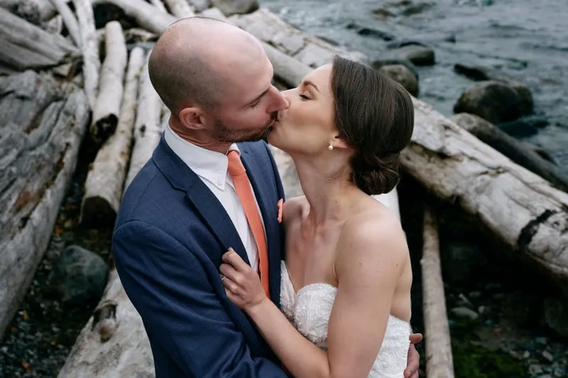 A kiss on the driftwood logs at the beach.