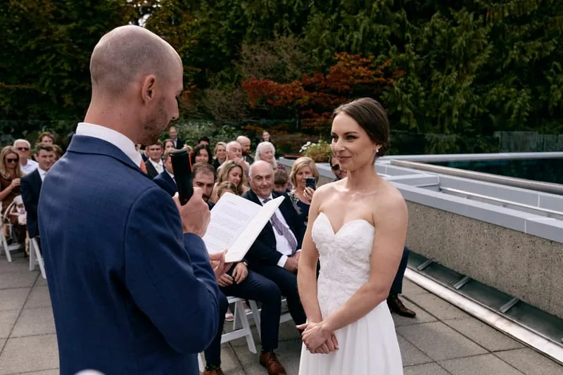 James reading his vows to Olivia.