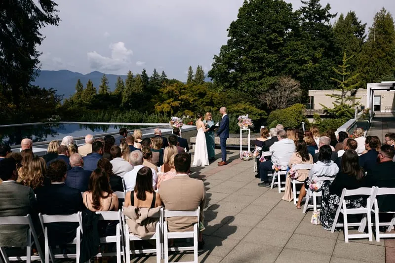 The ceremony from behind the last row, the terrace pool and the North Shore mountains beyond.