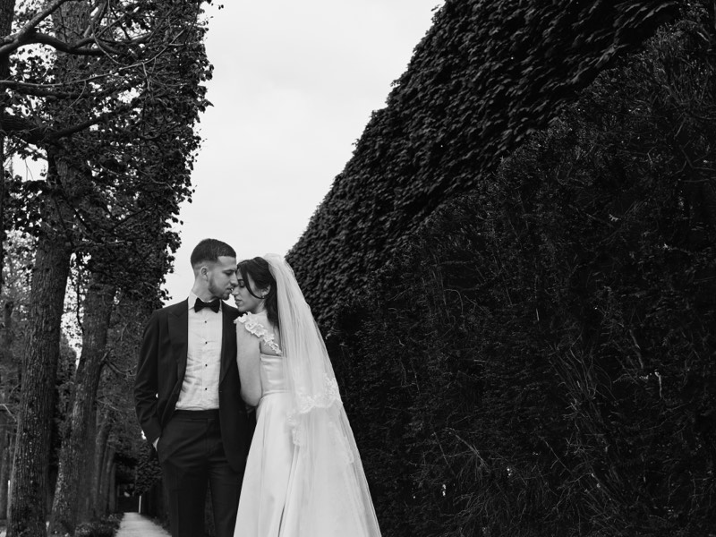 Detail of a veil and gown catching the light.