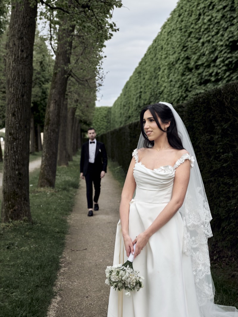 Bride and groom together at a formal chateau venue.
