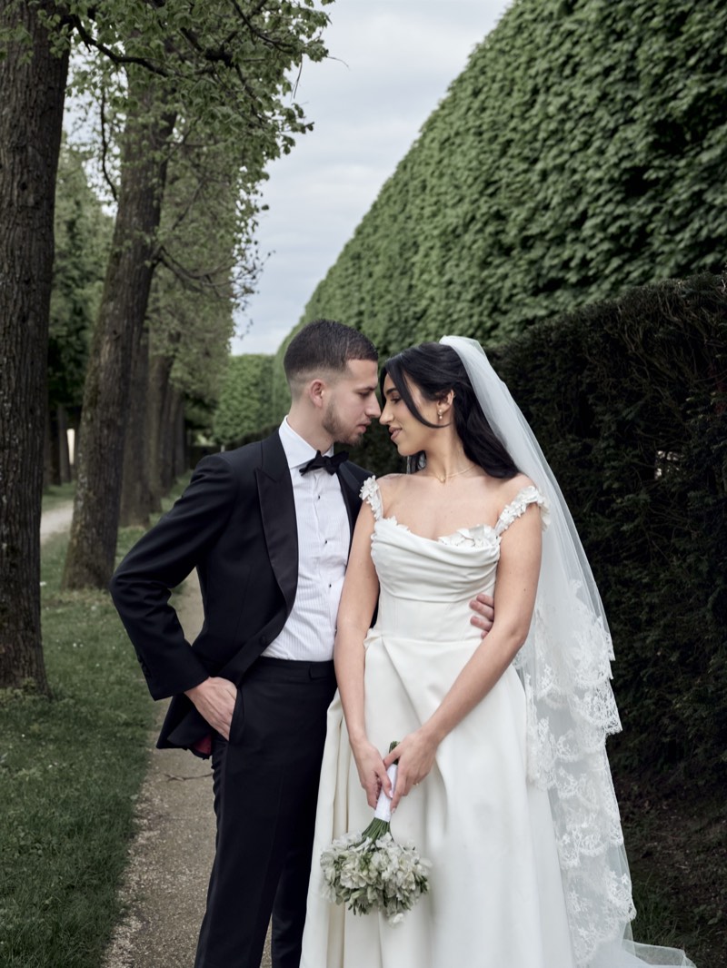 Bride and groom together at a formal chateau venue.