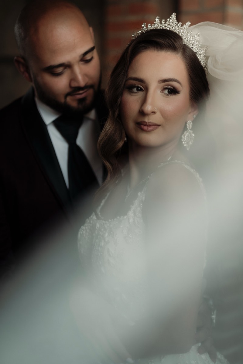 Bride and groom together at a formal chateau venue.